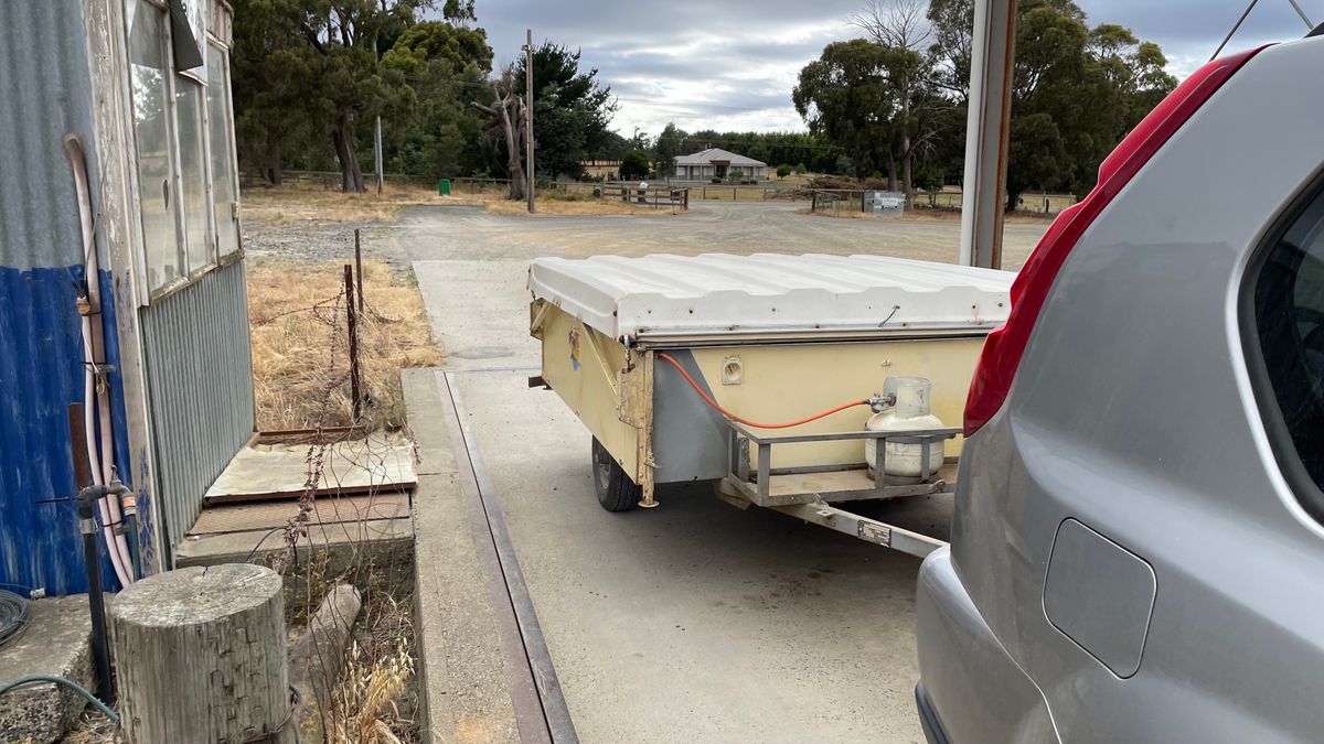 Camper being weighed at weigh station